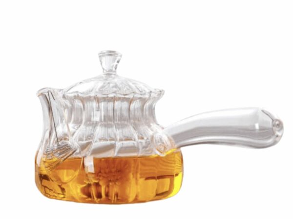 Théière avec manche.